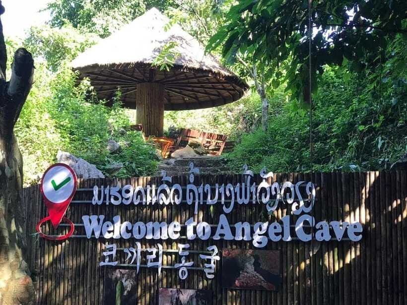 From Vientiane: Vang Vieng Tour with Cave Kayak & Zipline - Wat Kang adds a cultural stop