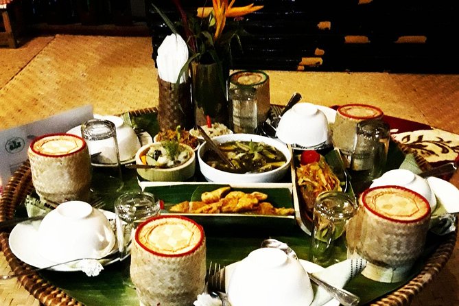 Full Day bamboo experience with cooking class & Kuang si waterfalls - Cooking bamboo into a Lao lunch