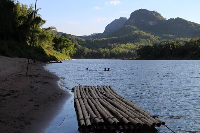 FULL DAY – Kuang Si Waterfall, Kayak on the Nam Ou / Mekong River, Pak Ou Caves - Whisky Village, a short cultural stop