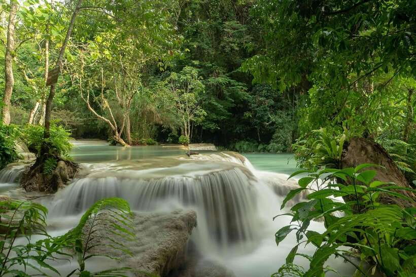 Kuang Si Waterfall, Tree Top Cafe, Ziplining - Village stops before the falls