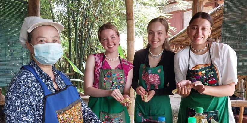 Luang Prabang: Bamboo Experience & Kuang Si Falls Tour - Music, games, and the human side of the visit