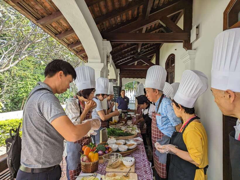 Luang Prabang: Cooking Class at the Former Royal Palace - A Lao cooking class with a market before the stove