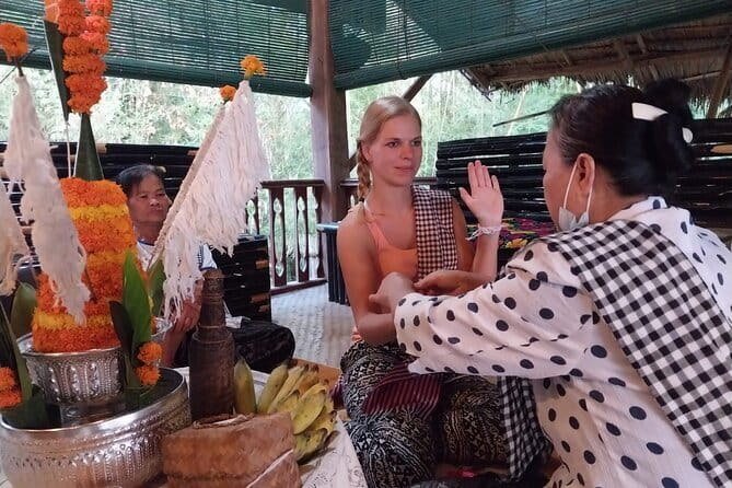 Luang Prabang Cooking, Pottery & Candle Experience - Shaping clay at P70