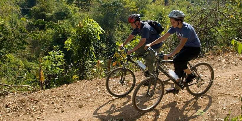 Luang Prabang: Countryside Mountain Bike Tour with Lunch - Rice paddies, hills, and mixed riding surfaces