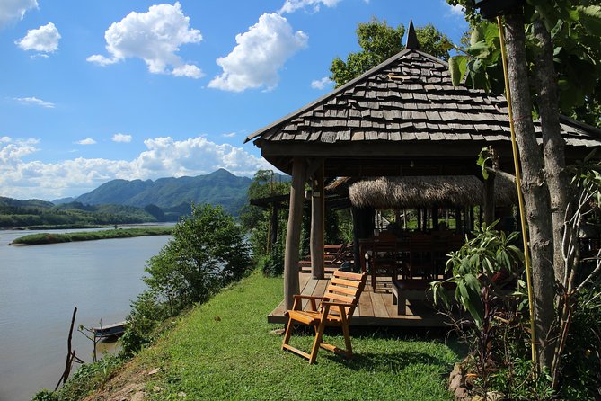 Luang Prabang: Cruise to Pak Ou Caves & Kuang Si Waterfalls - A short Hmong village and cultural stop