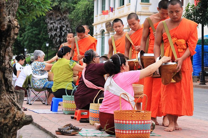 Luang Prabang Early Morning Alms Giving and Wet Market - From quiet streets to the morning wet market