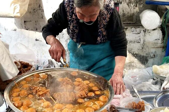Luang Prabang Evening Food Tour by Tuk-Tuk - Starting near Wat Xiengthong and the Old Quarter