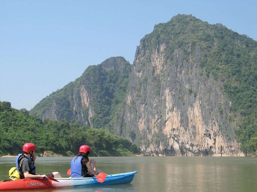 Luang Prabang: Kayak Tour to Pak Ou Caves - Entering the two Pak Ou Caves