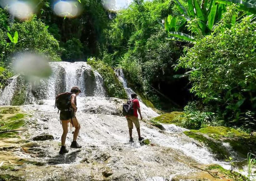 Nong Khiaw: 100 Waterfalls, Nam Ou & Khmu Village Day Tour - Walking through paddies and streams to Done Khoun