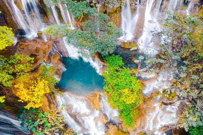Pak Ou Caves and Kuang Si Fall Day Tour - Kuang Si Falls and the 50-meter drop