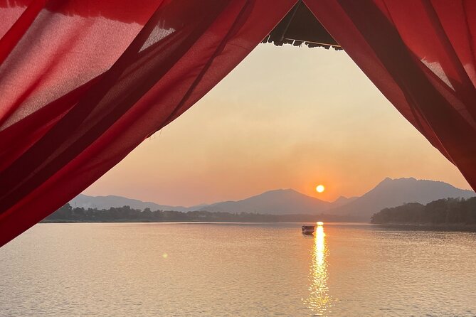 Sunset Cruise Luang Prabang - A cocktail, snacks, and the onboard atmosphere