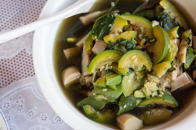Traditional Market Tour and Private Laotian Cooking Class with a Local - How this compares with an ordinary market tour