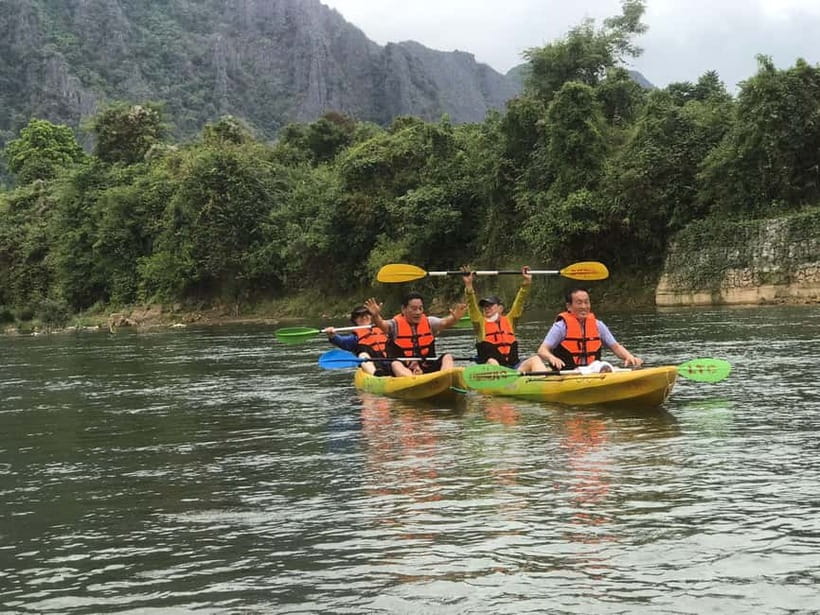 Vang Vieng: Day Tour with Kayaking, Ziplining, and Rafting - Tubing through Tham Chang Cave
