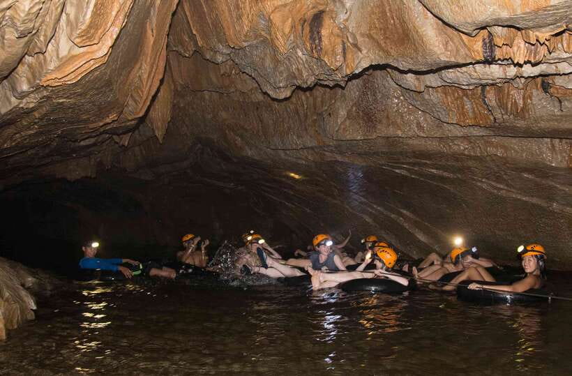 Vang Vieng: Half-Day Zip Lining with Cave Exploration Option - Above Vang Vieng’s forest and river