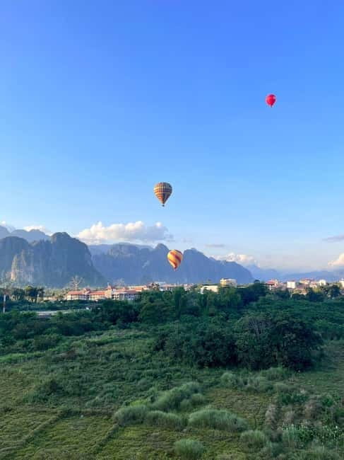 Vang Vieng: Hot Air Balloon Ride with City Hotel Pickup - Preparing for the balloon launch