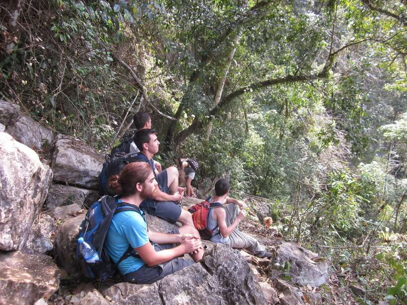 Vang Vieng: Jungle & Caves Full-Day Private Trekking Tour - Climbing the ridge above Vang Vieng