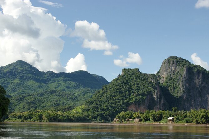 Vientiane Day Trip By Bike To Tad Moon Waterfall - A gentle road descent toward Ban Mai